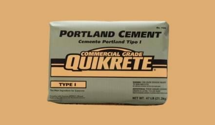 A bag of cement or concrete mix that weigh around 40 lbs